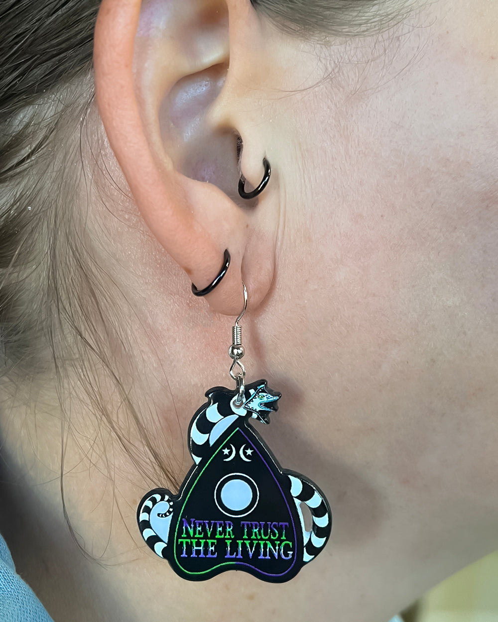 Never Trust Earrings